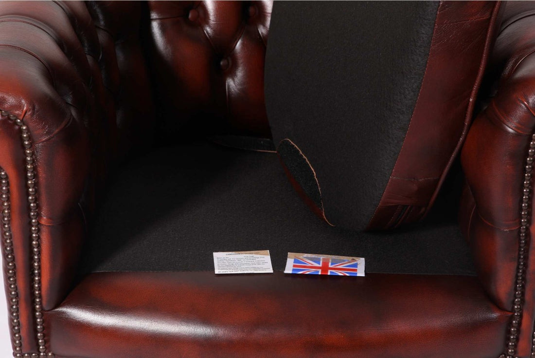 Coppia di poltrone chesterfield a pozzetto vintage originale marrone