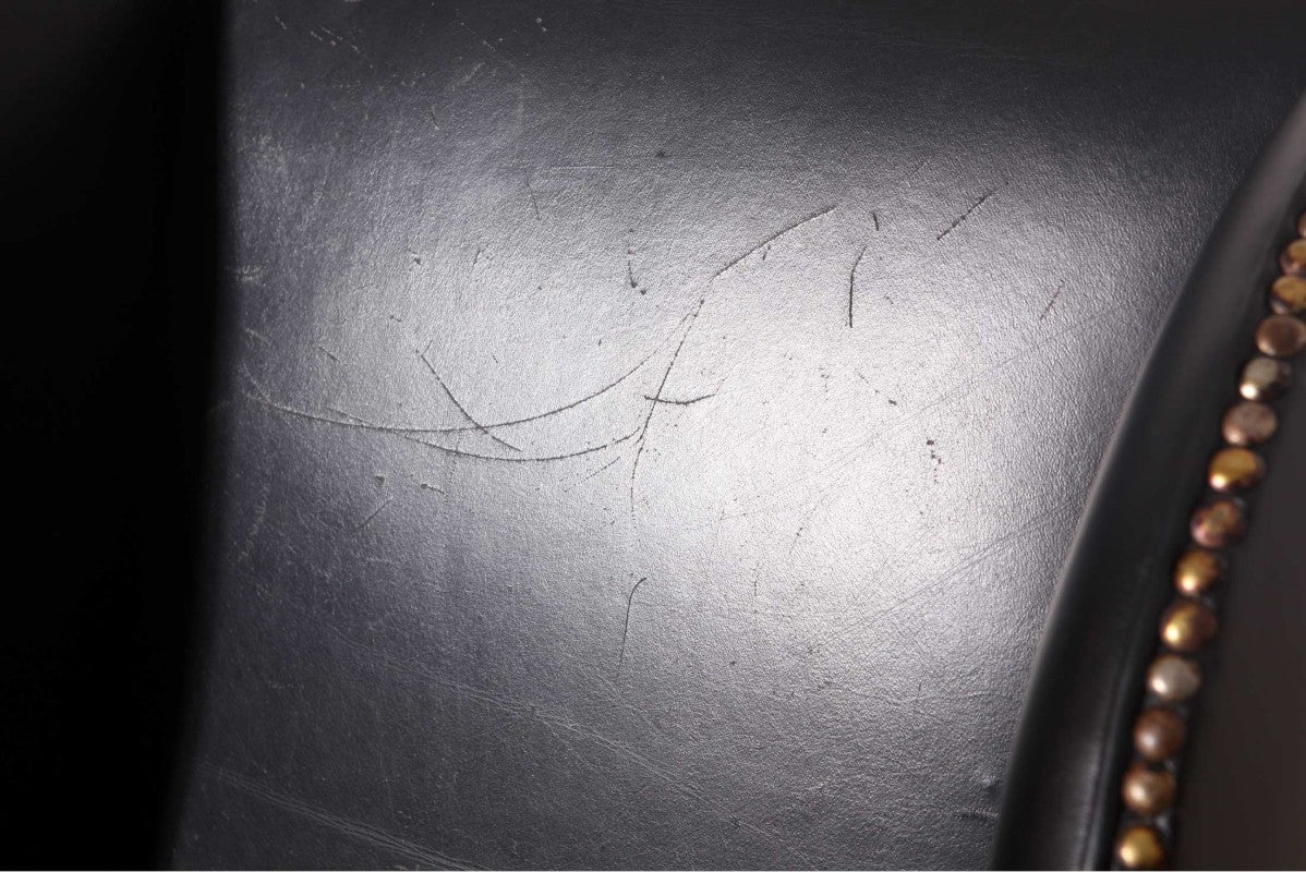 Antica coppia di poltrone wing back o bergere inglese originale in pelle nera - Antichità Sale