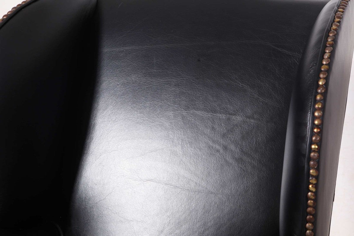 Antica coppia di poltrone wing back o bergere inglese originale in pelle nera - Antichità Sale