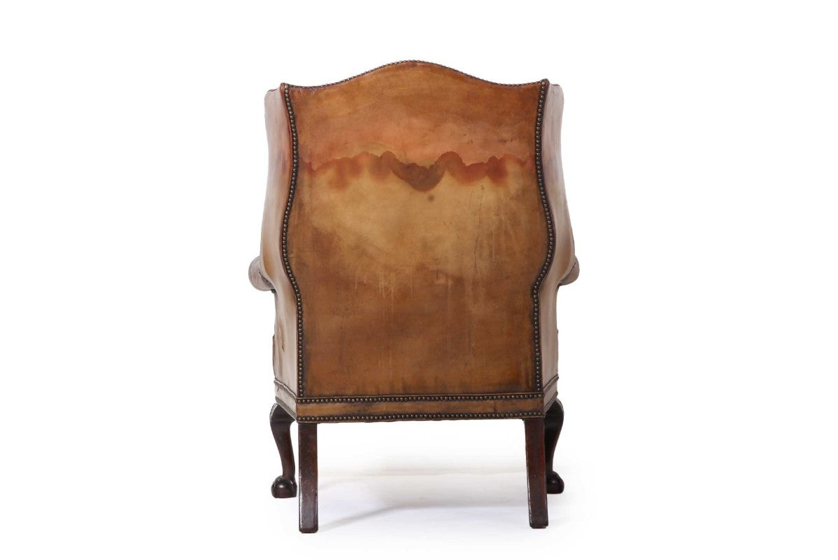 Antica coppia di poltrone wing back o bergere inglese originale in cuoio cognac - Antichità Sale