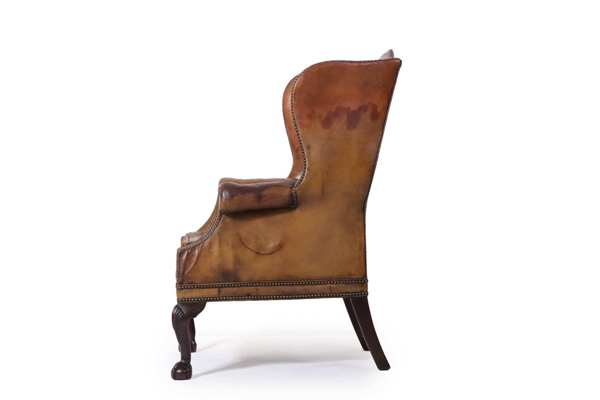Antica coppia di poltrone wing back o bergere inglese originale in cuoio cognac - Antichità Sale
