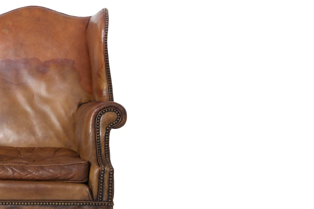Antica coppia di poltrone wing back o bergere inglese originale in cuoio cognac - Antichità Sale