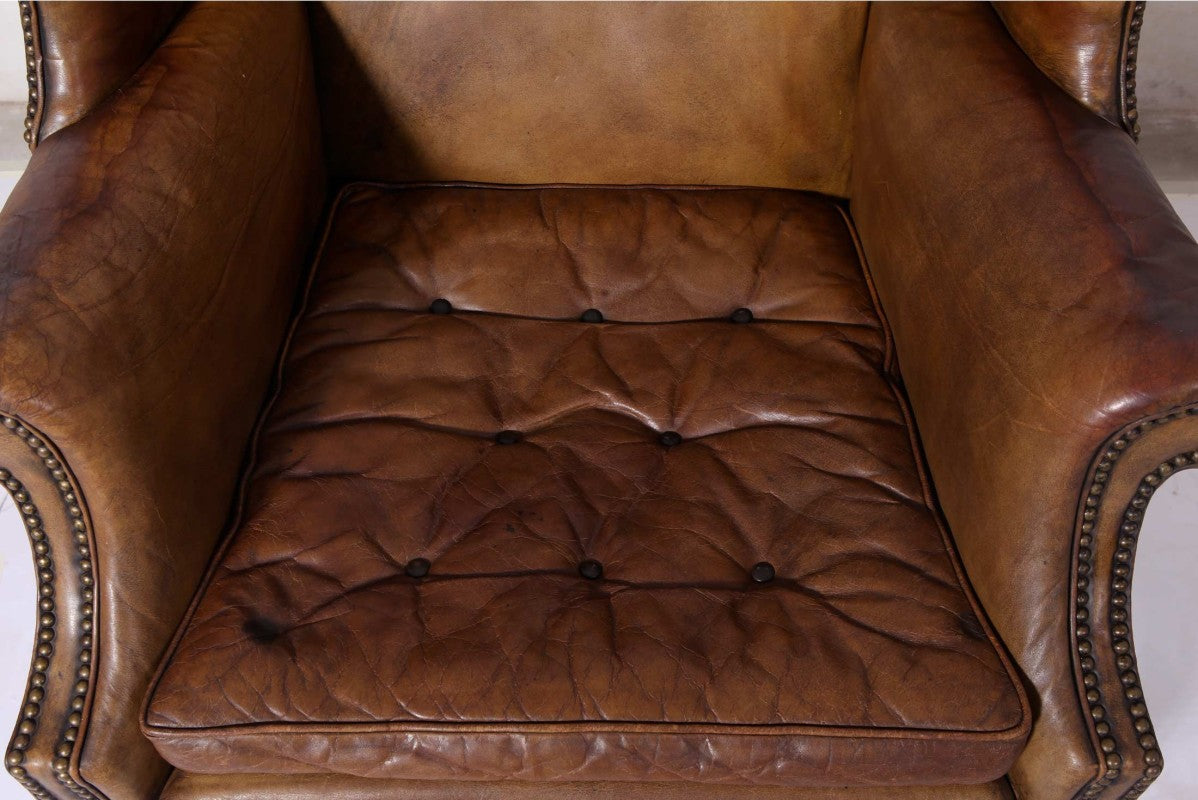 Antica coppia di poltrone wing back o bergere inglese originale in cuoio cognac - Antichità Sale