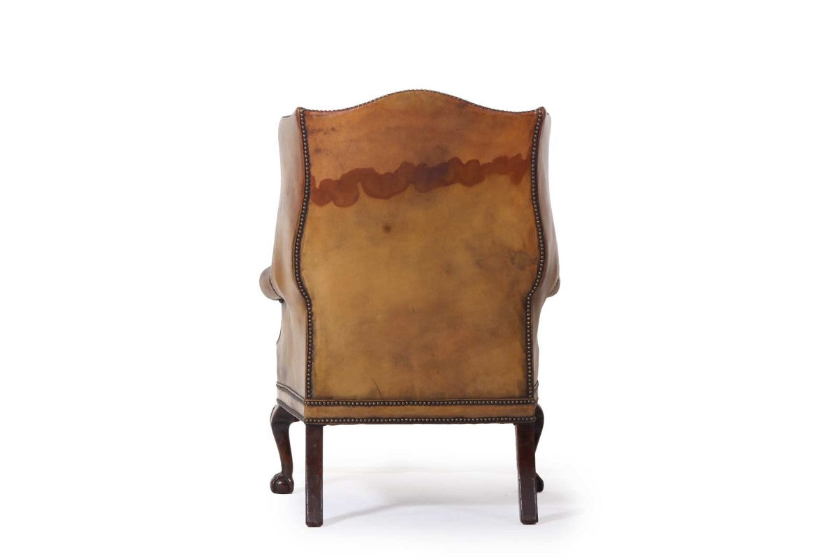 Antica coppia di poltrone wing back o bergere inglese originale in cuoio cognac - Antichità Sale