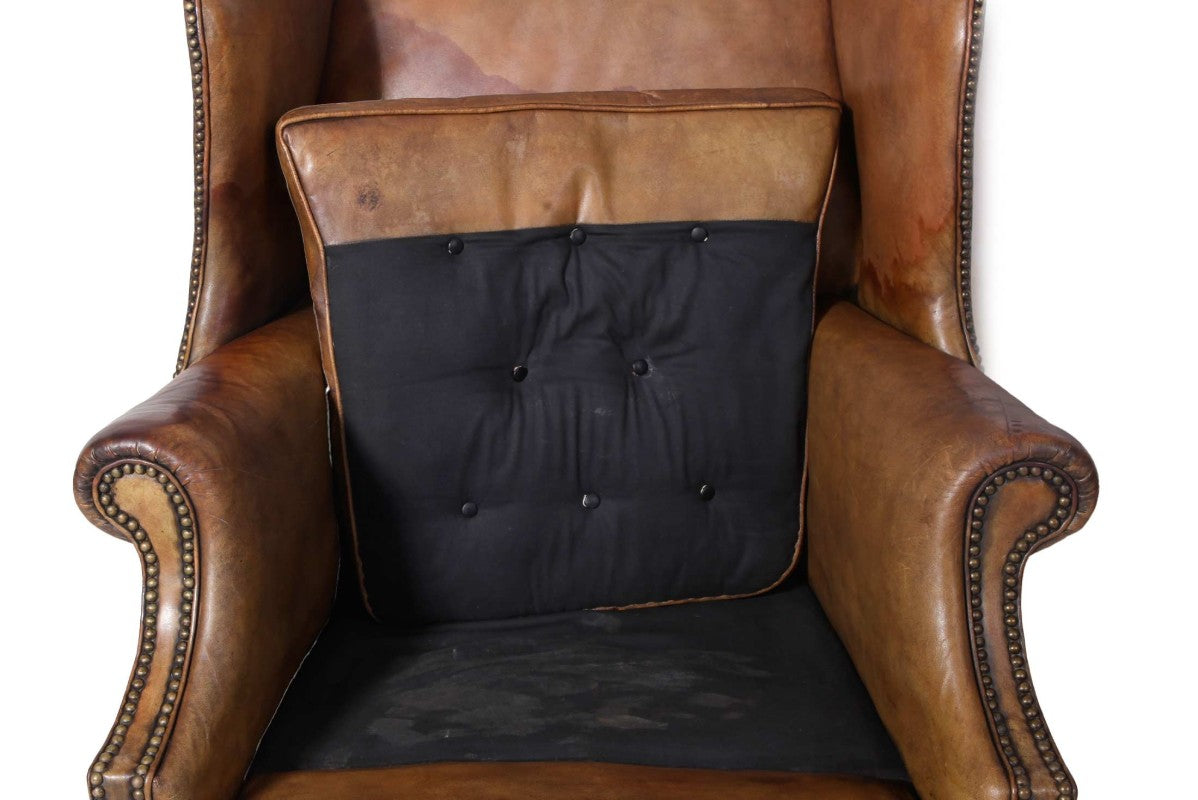 Antica coppia di poltrone wing back o bergere inglese originale in cuoio cognac - Antichità Sale