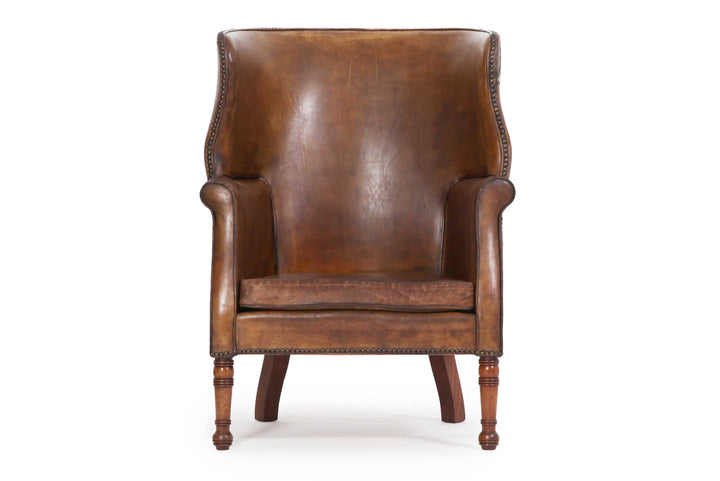 Antica e originale poltrona inglese barrel back marrone cognac