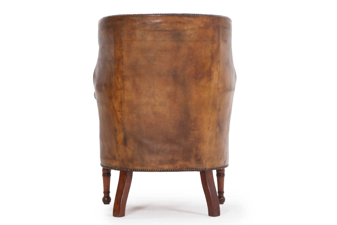 Antica e originale poltrona inglese barrel back marrone cognac
