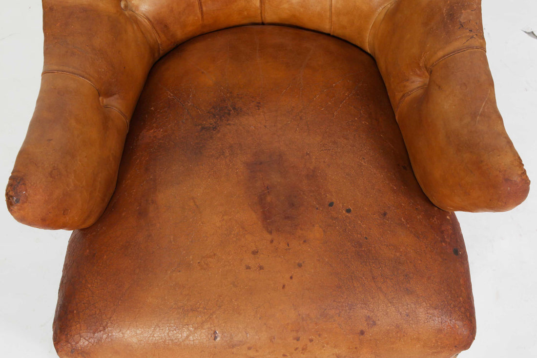 Antica poltrona chesterfield inglese originale in pelle tabacco