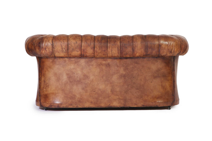 Antico divano chesterfield club 2 posti inglese originale marrone cognac