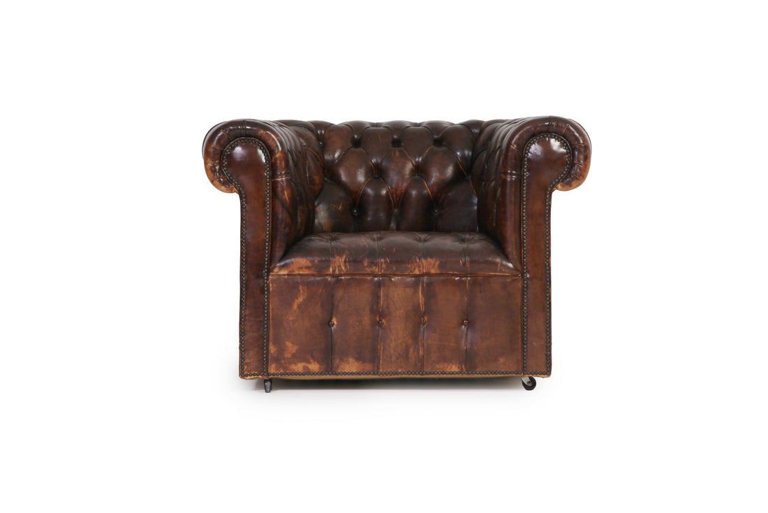 Antica poltrona chesterfield club inglese originale in pelle marrone anticato