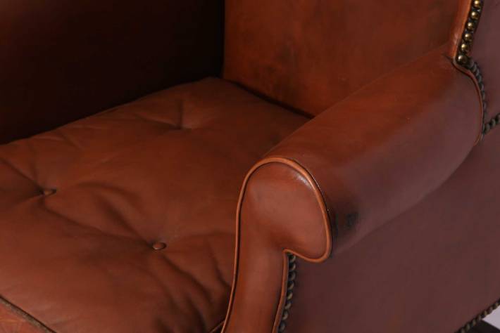 Coppia di poltrone bergere inglese originale vintage in pelle marrone cognac